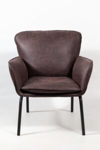 Closeup shot of a dark brown leather armchair Chair